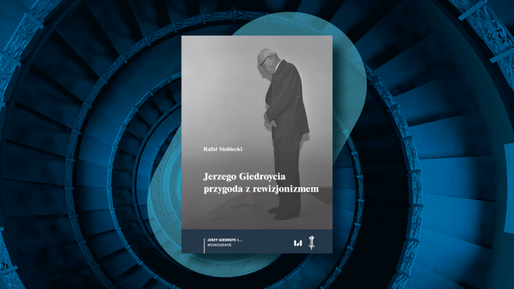 szara okładka książki na granatowym tle